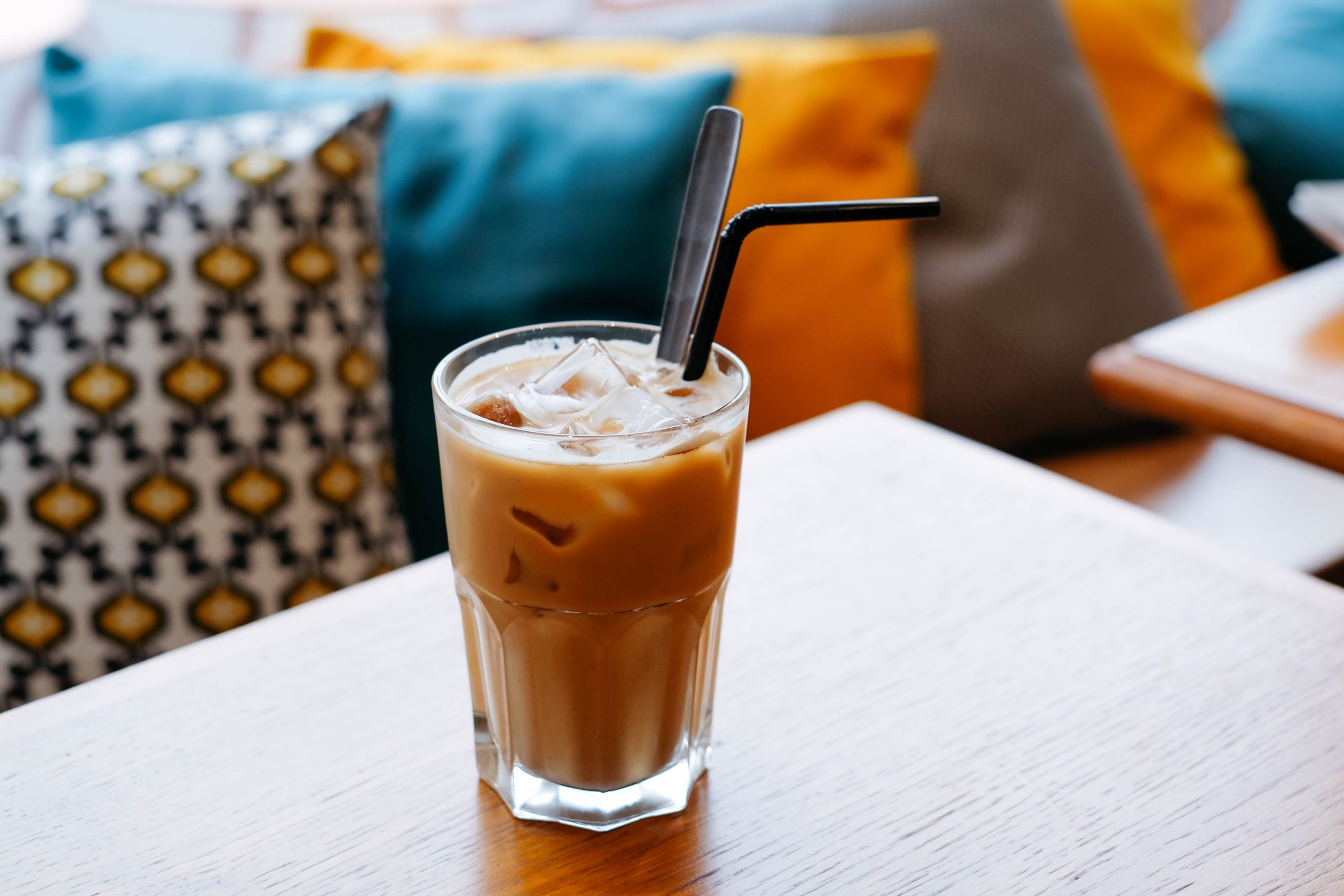 Iced coffee on a table, living room atmosphere
